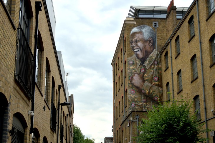 14 Mural of  Nelson Madela at New Cross painted to mark Mandela Day an example of new trend for large scale commissioned art on exterior of houses.jpg